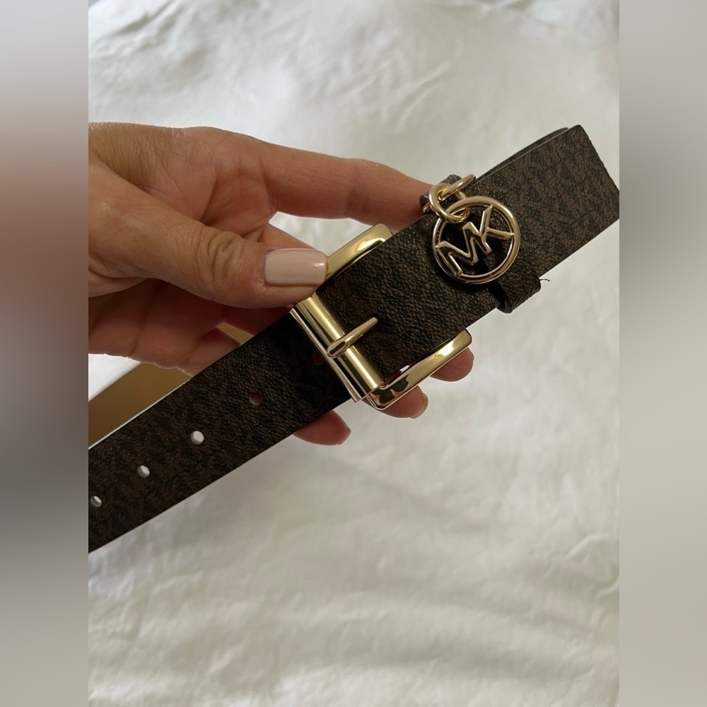 MICHAEL KORS BELT CHOCOLATE MK LOGO WITH MK CHARM GOLD BUCKLE.
